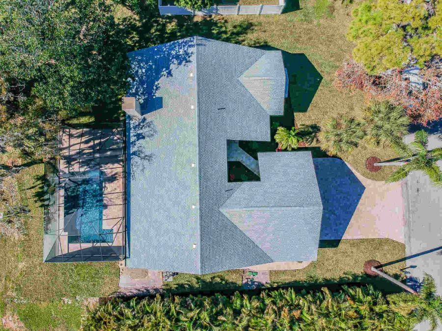 Aerial top down view of roof and pool — Custom home addition, pool, and renovation, Bradenton