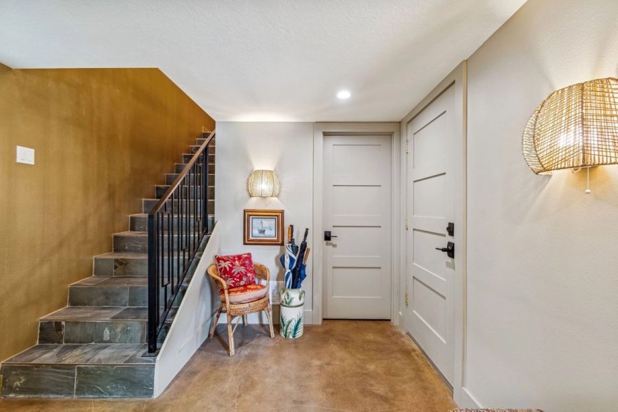 Interior ground floor staircase slate tile treads iron railing woven — Custom home addition, Longboat Key
