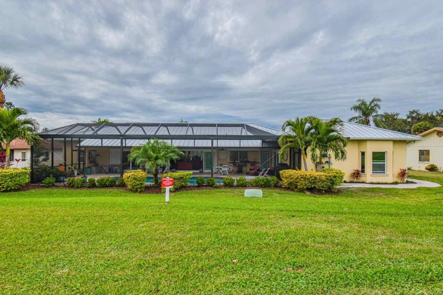 Exterior rear screened lanai — Custom design-build near IMG Academy, West Bradenton