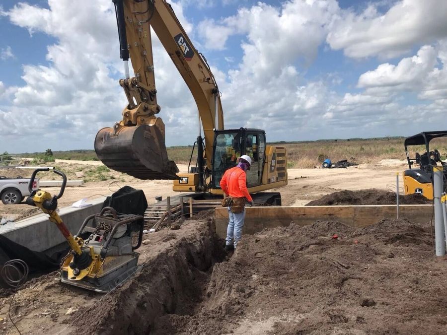 Excavator trench plate compactor — Florida Everglades Annex Restoration