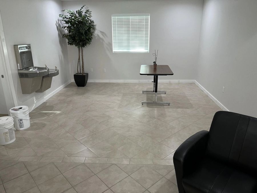 Water fountain room tile flooring — Bradenton Research Center