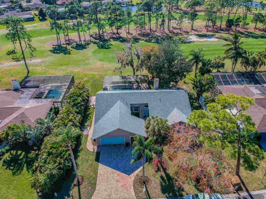 Aerial view of house roof and golf course — Custom home addition, pool, and renovation, Bradenton
