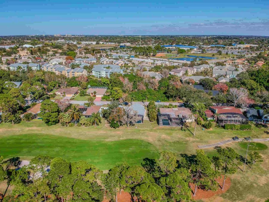 Aerial view of neighborhood wide angle — Custom home addition, pool, and renovation, Bradenton