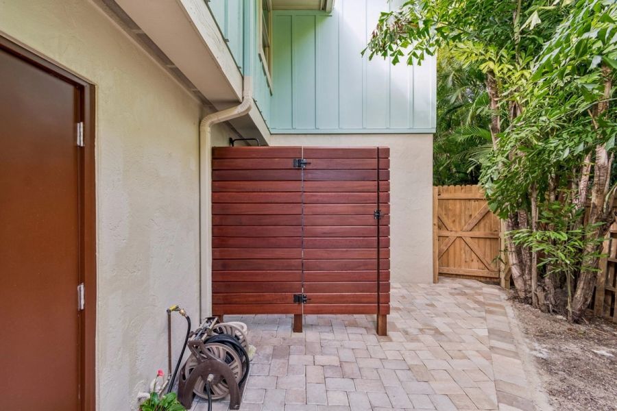 Exterior outdoor shower enclosure cedar wood — Custom home addition, Longboat Key