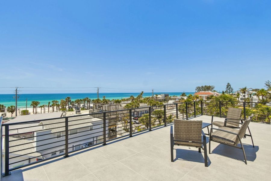 Rooftop patio with panoramic Gulf views — Coastal custom home, Bradenton Beach