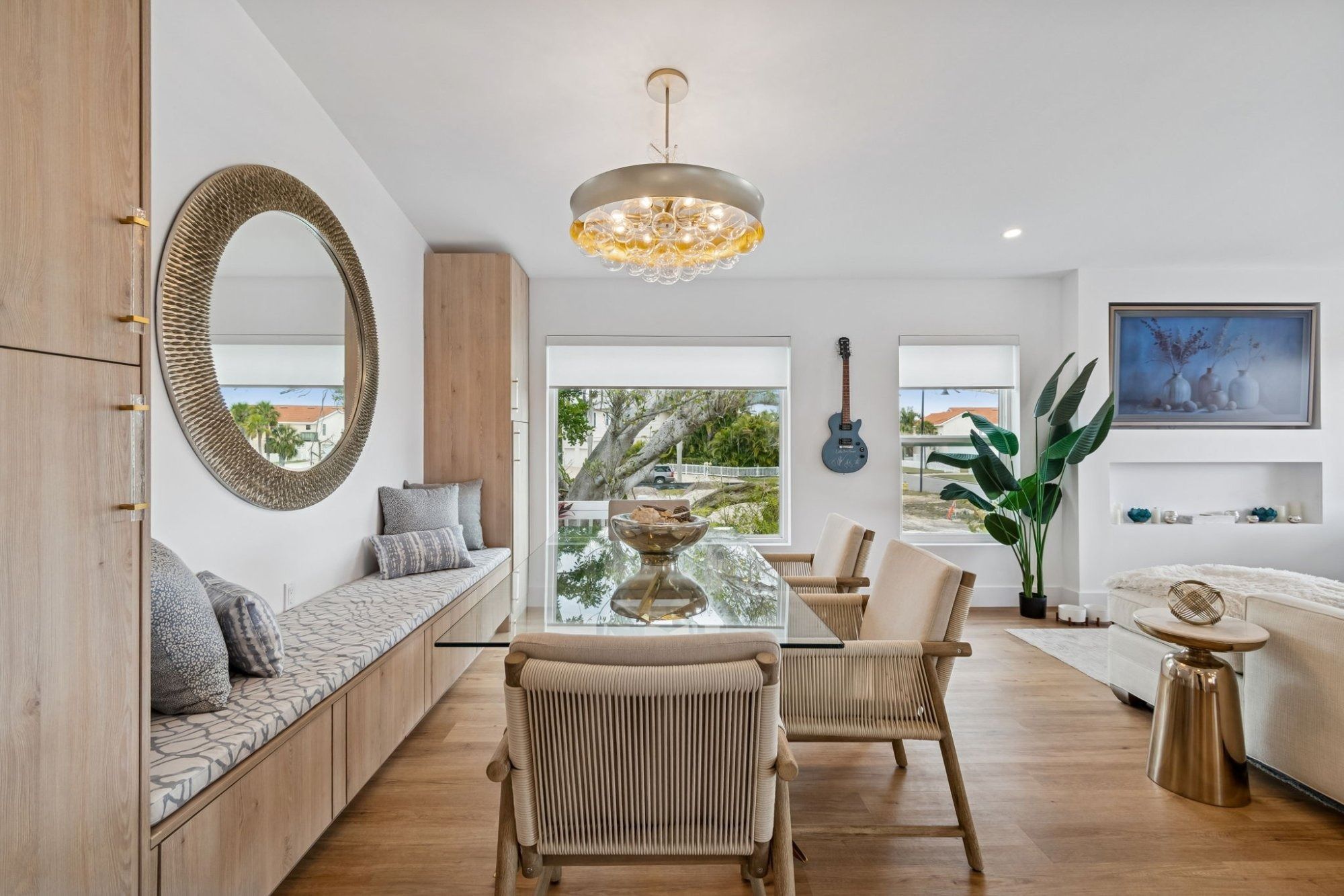 Interior dining room glass table woven chairs — New home construction, Longboat Key