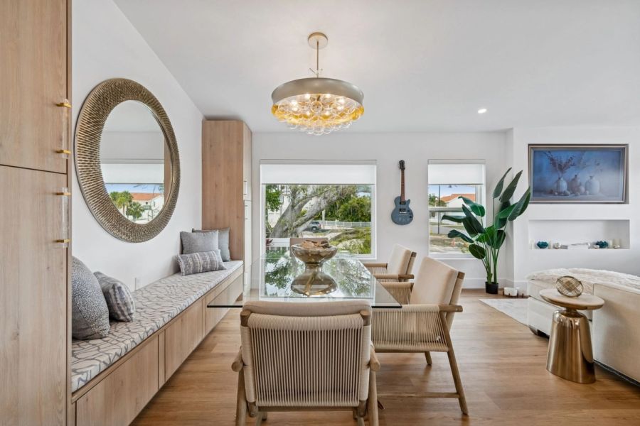 Interior dining room glass table woven chairs — New home construction, Longboat Key