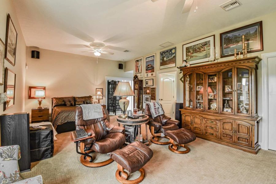 Den media room recliners gallery wall — Custom design-build near IMG Academy, West Bradenton