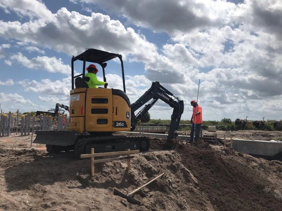 Mini excavator trench digging — Florida Everglades Annex Restoration