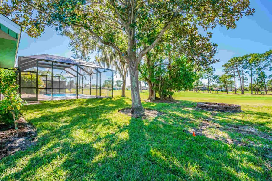 Backyard pool enclosure and fire pit — Custom home addition, pool, and renovation, Bradenton