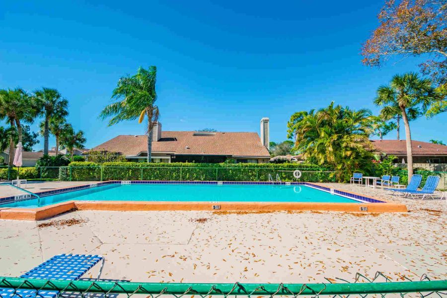 Pool area with lounge chairs — Custom home addition, pool, and renovation, Bradenton