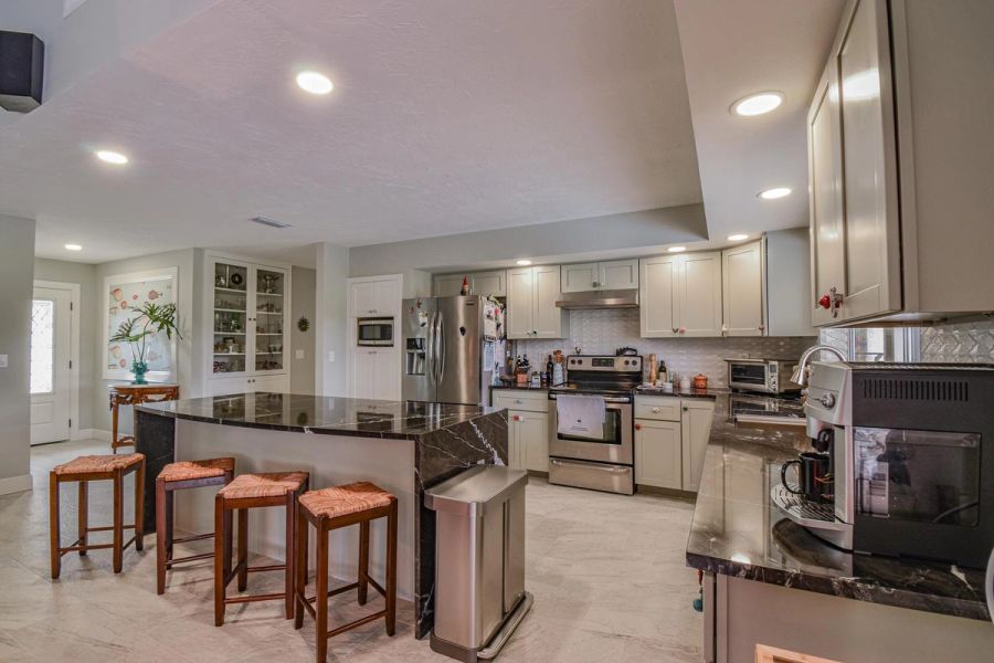 Kitchen china cabinet fish art — Custom design-build near IMG Academy, West Bradenton