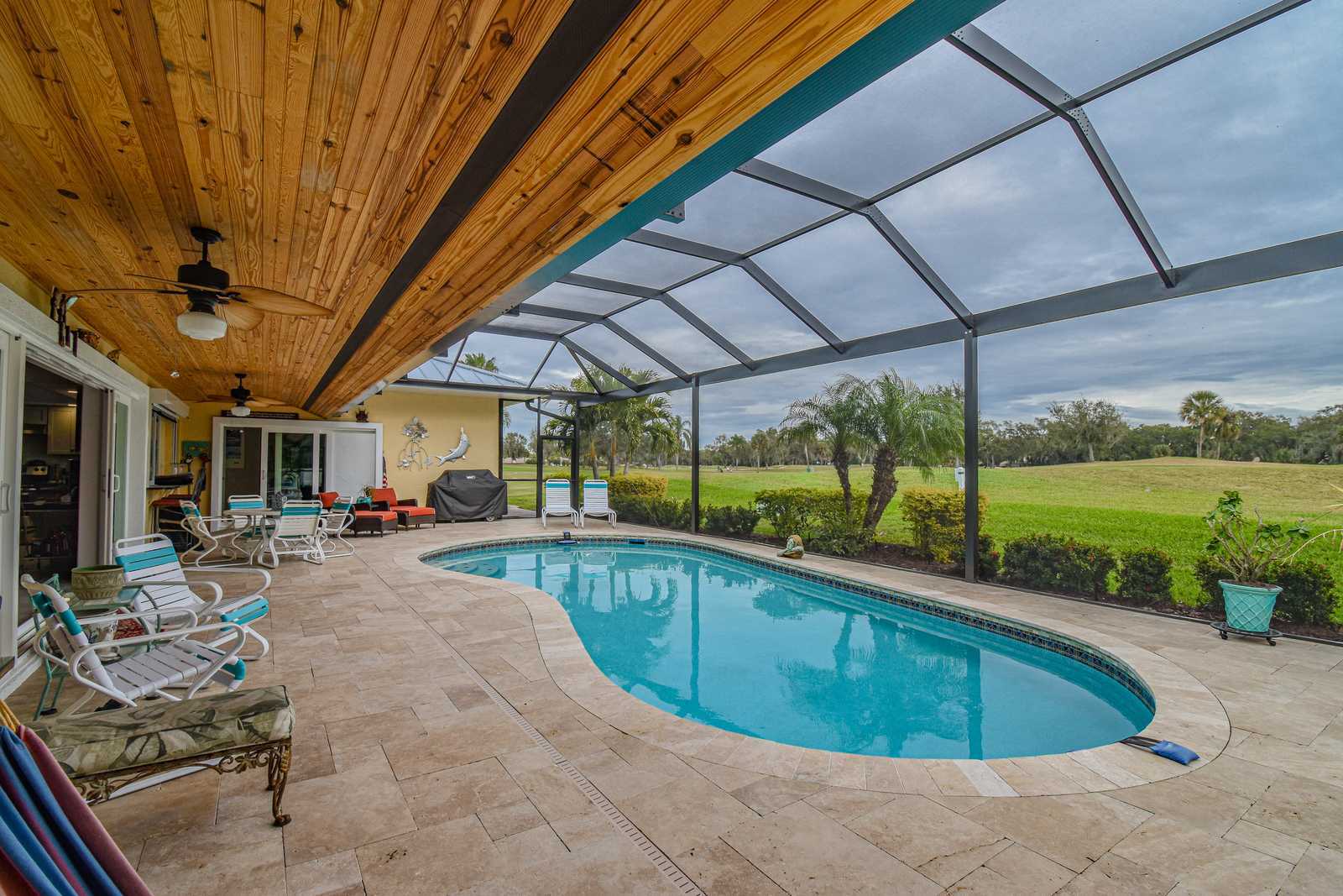Lanai pool hammock golf view — Custom design-build near IMG Academy, West Bradenton