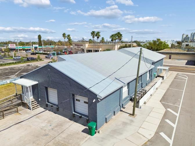 Palmetto Commercial Building Aerial Gray Stucco Metal Roof