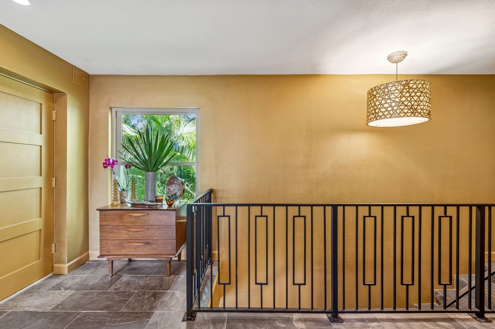 Interior upper landing gold accent walli iron railing woven pendant — Custom home addition, Longboat Key