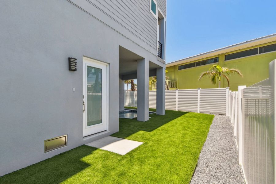 Private side entrance and yard — Coastal custom home, Bradenton Beach