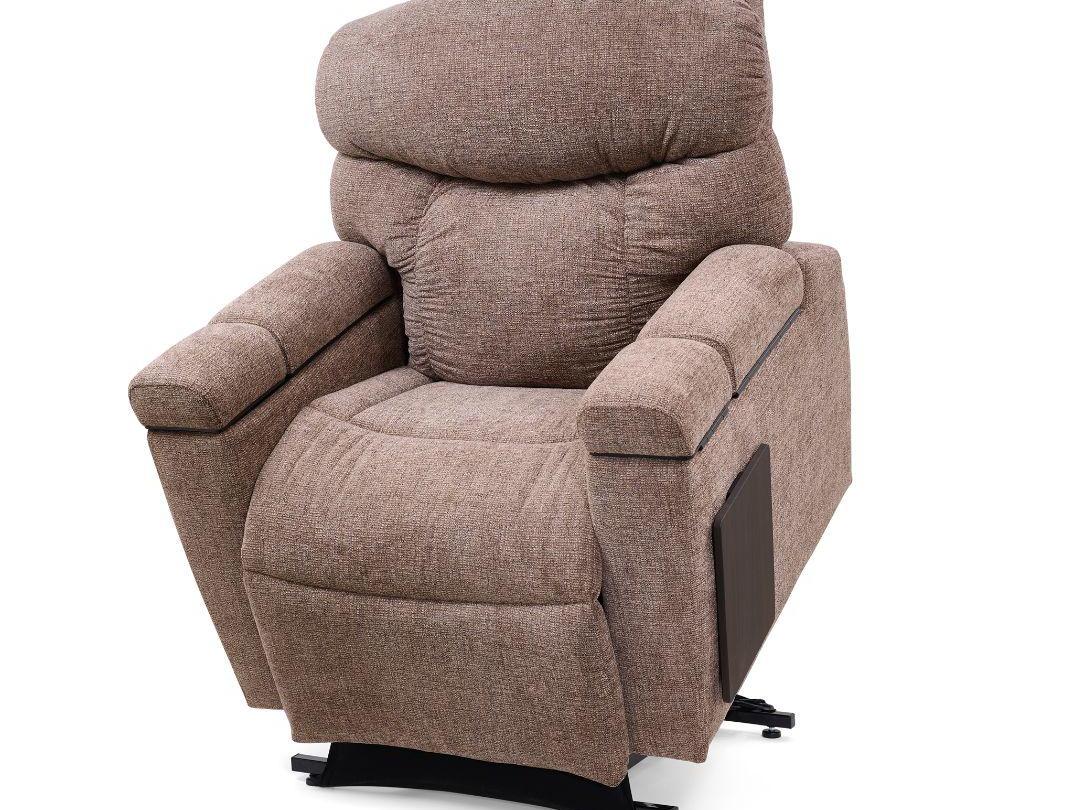 Maya recliner in taupe fabric, slightly lifted, with its tray table at the side