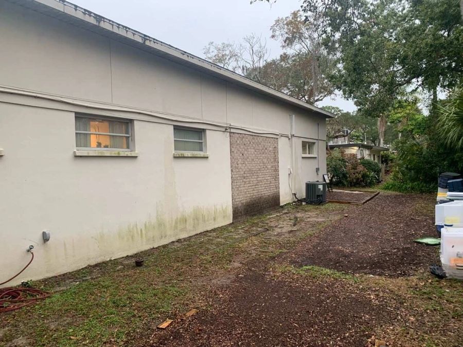 Before: exterior wall mildew renovation — Bradenton Research Center