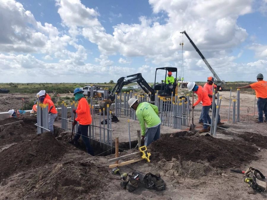 Trench conduit installation crew — Florida Everglades Annex Restoration
