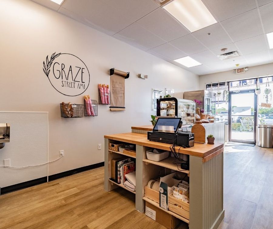 Graze street ami checkout counter logo wall — Graze Street renovation, Holmes Beach, FL