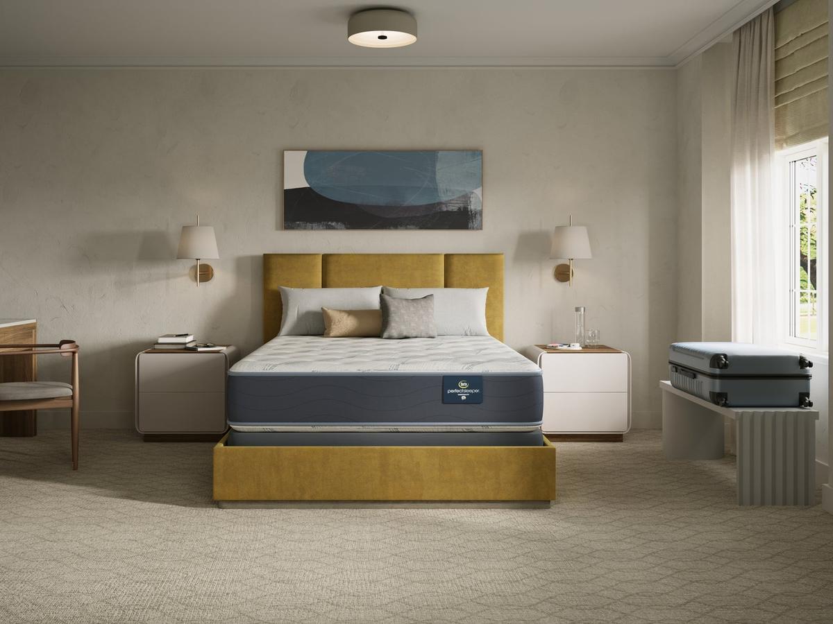 Master Suite Plush mattress made up with bedding in a bedroom