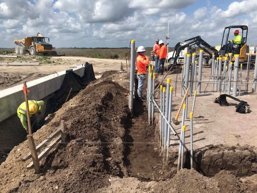 Trench excavation dump truck — Florida Everglades Annex Restoration