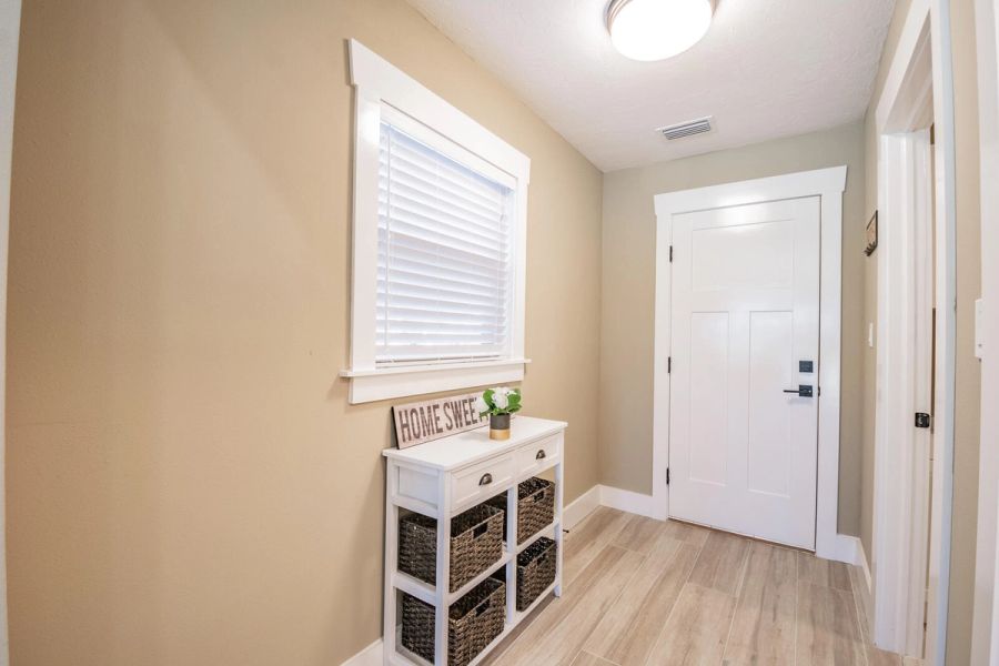 Entryway hall with front door and console table — Custom home addition, pool, and renovation, Bradenton