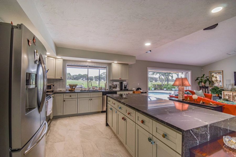 Kitchen fridge golf view — Custom design-build near IMG Academy, West Bradenton