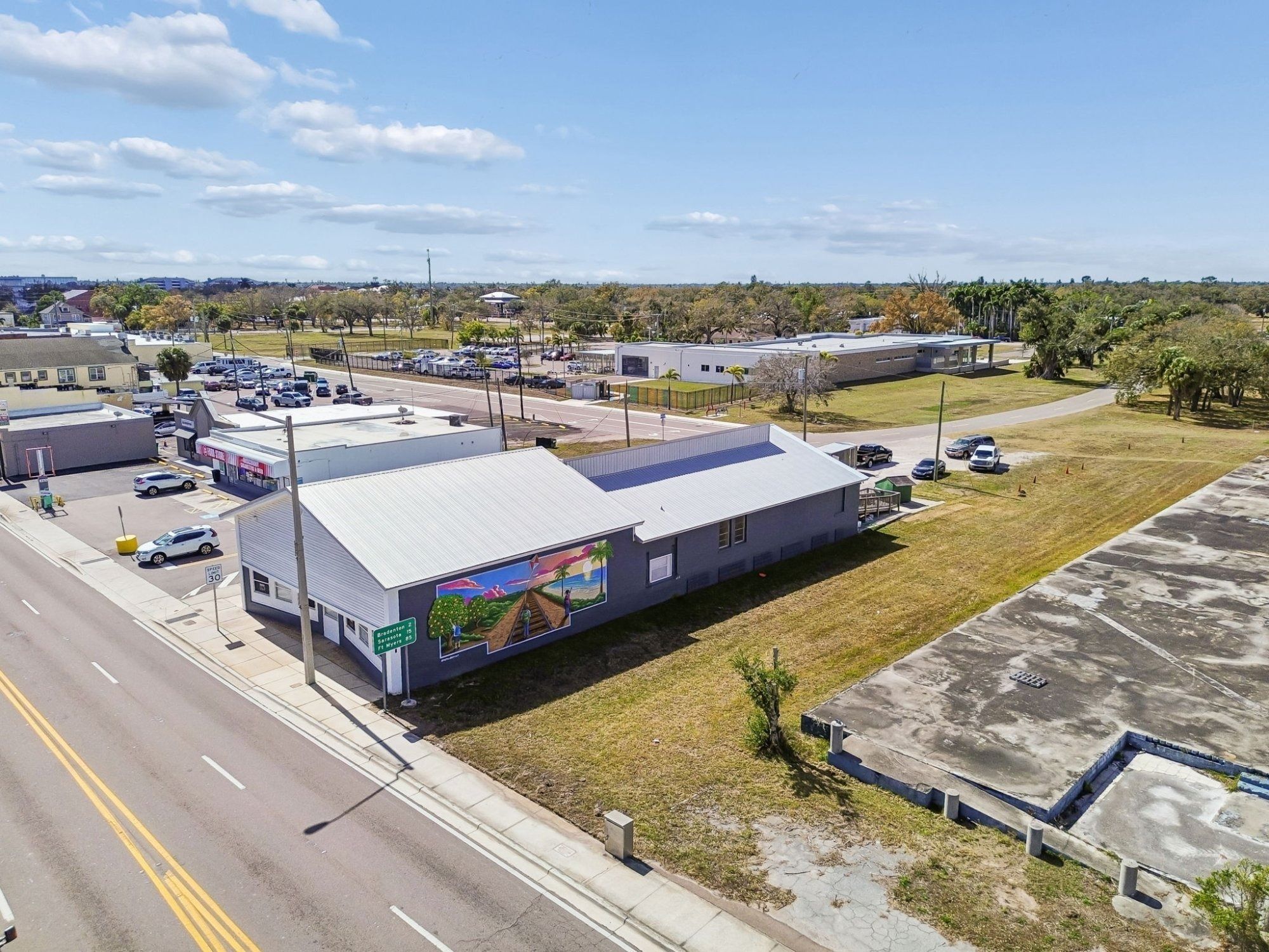 Aerial street mural side wall — Commercial building renovation, Palmetto
