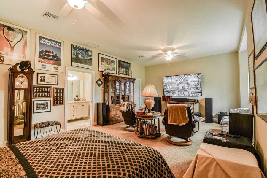 Den gallery wall china cabinet — Custom design-build near IMG Academy, West Bradenton