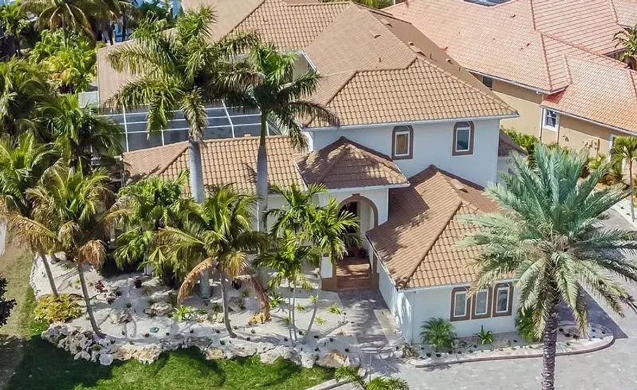 The fishcamp aerial exterior tile roof palm trees — Custom home addition, Cortez