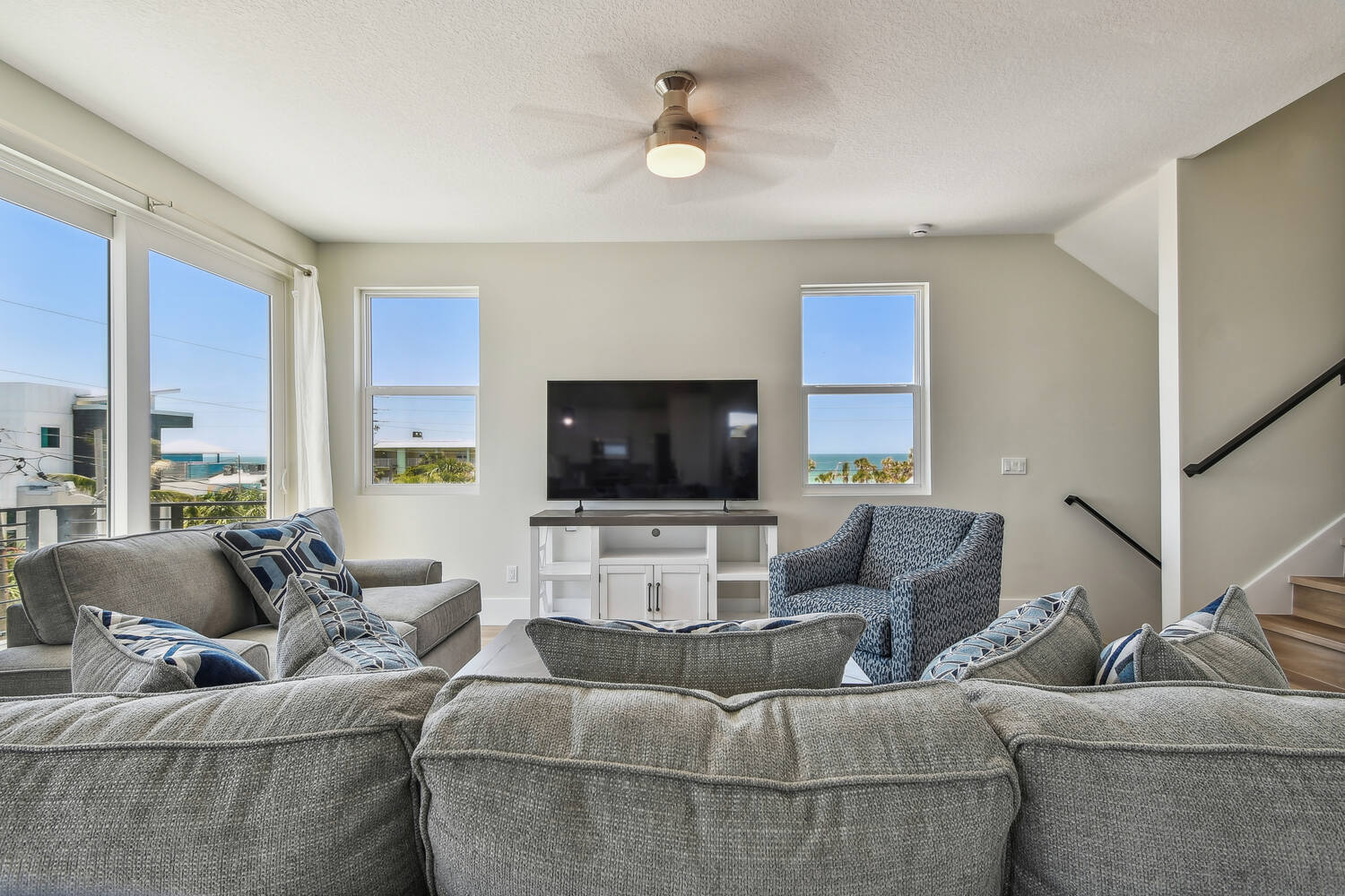 Living room with coastal decor and ocean views — Coastal custom home, Bradenton Beach