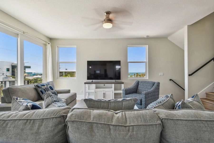 Living room with coastal decor and ocean views — Coastal custom home, Bradenton Beach