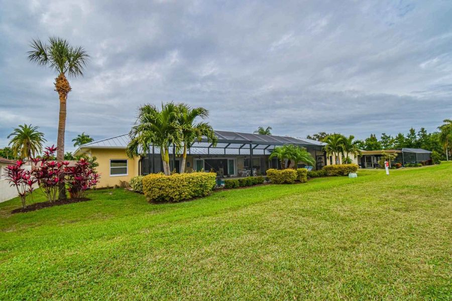 Exterior rear hillside view — Custom design-build near IMG Academy, West Bradenton