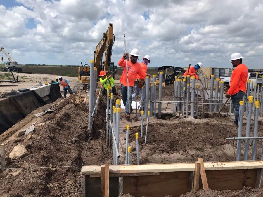 Excavator survey conduit trench crew — Florida Everglades Annex Restoration