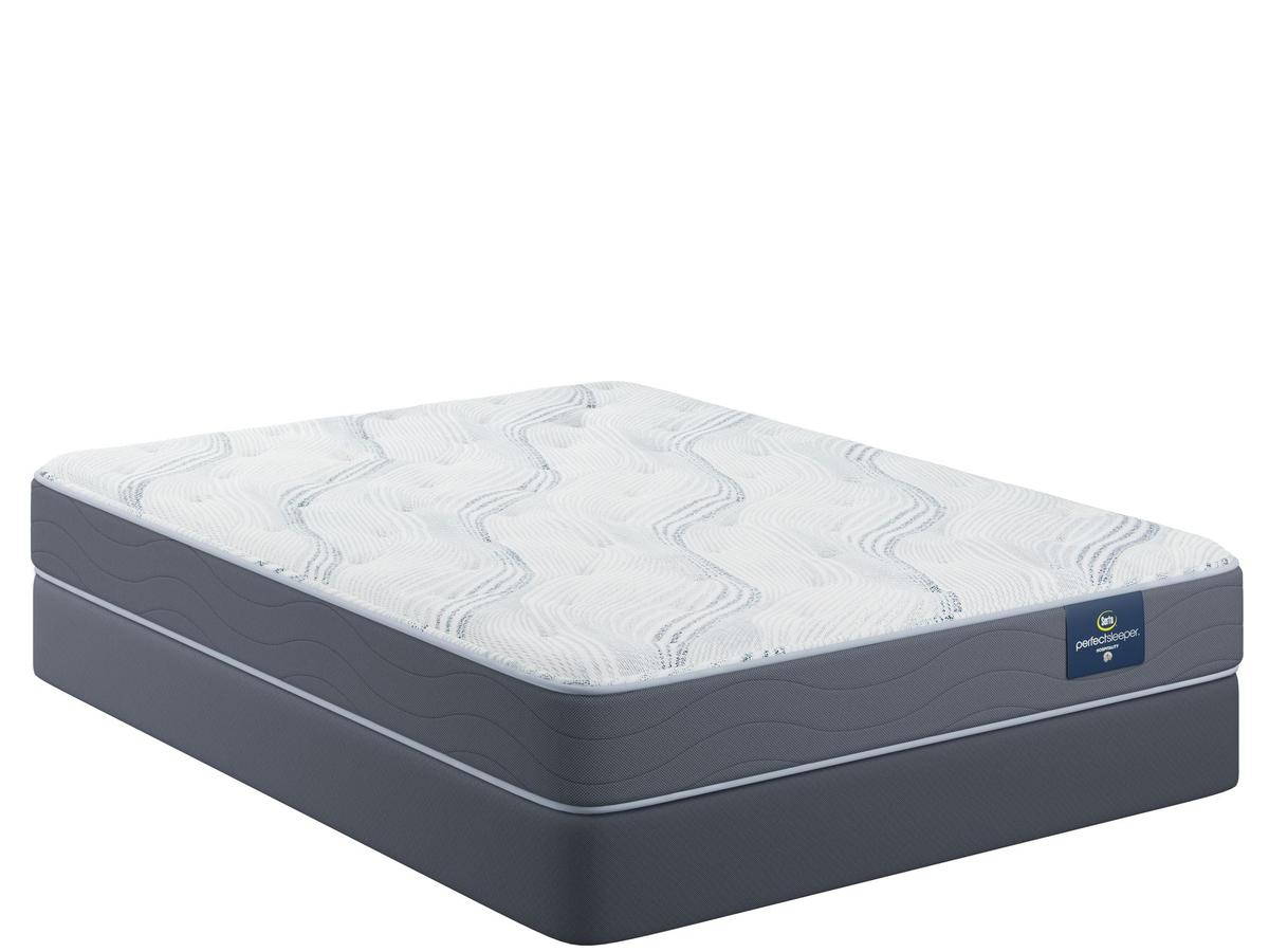 Concierge Suite mattress on its foundation, angled studio shot on a white background