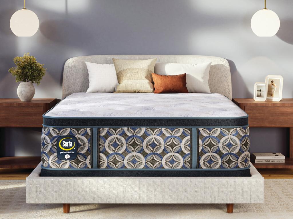 Cascade Range Plush Pillow Top mattress made up on a bed in a bedroom
