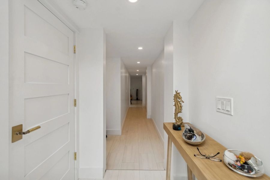 Interior entry hallway light wood floors — New home construction, Longboat Key