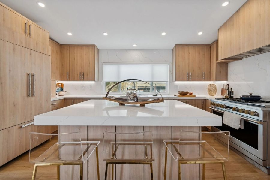 Interior kitchen island gas range wood cabinets quartz — New home construction, Longboat Key