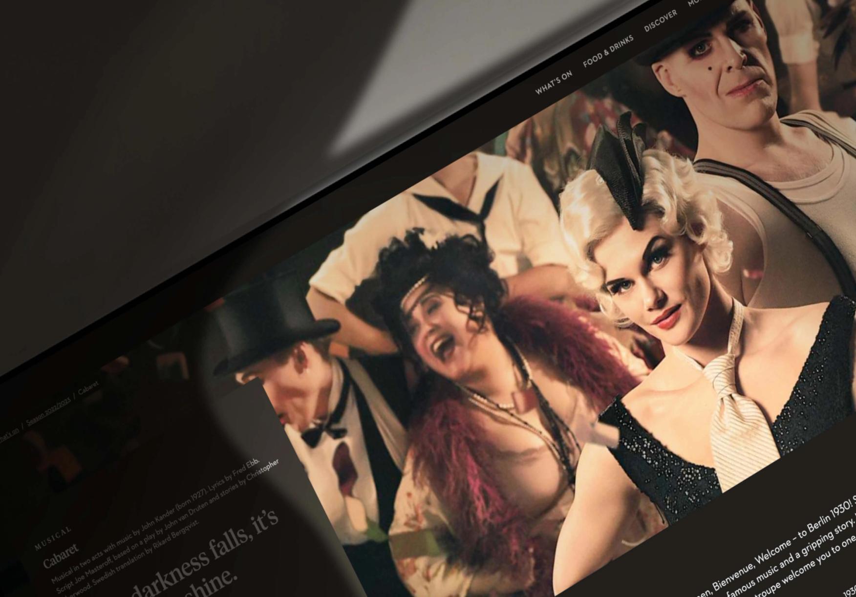 The Göteborgsoperan website shown on a laptop, with the image of a 1920's style woman with blonde hair.