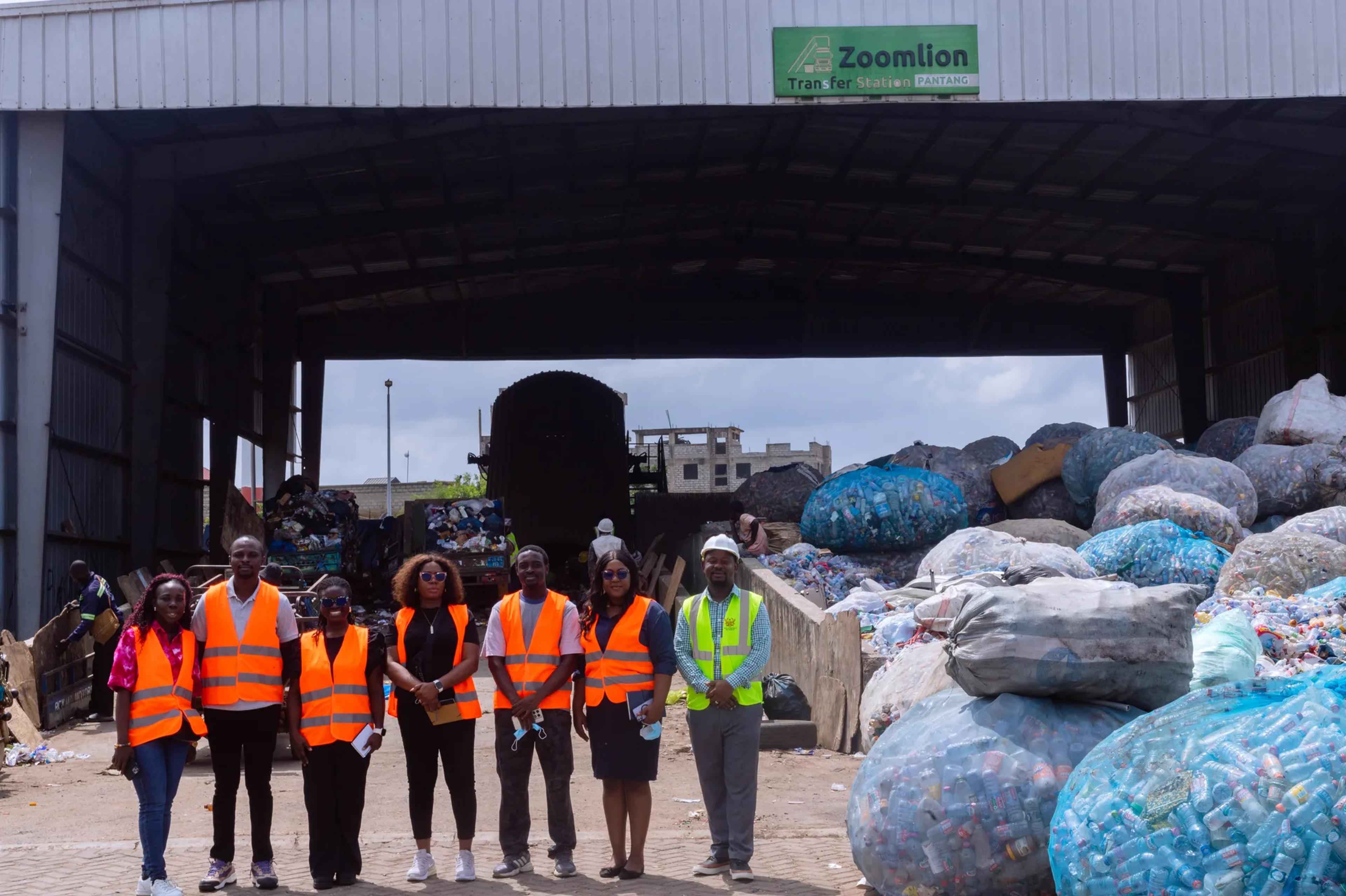 The team under the shed of the transfer station