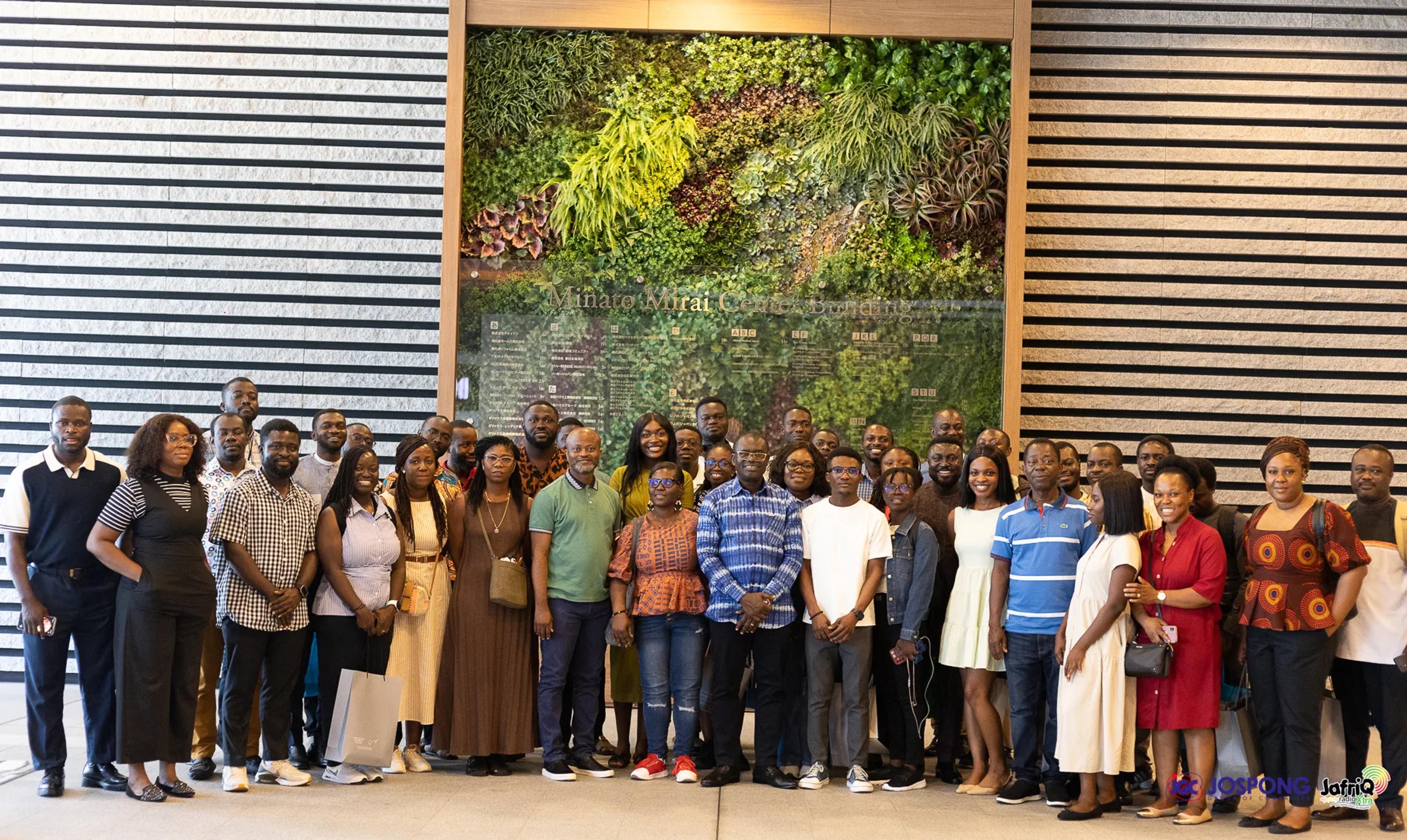 Full group of students and guests gathered for a closing photo