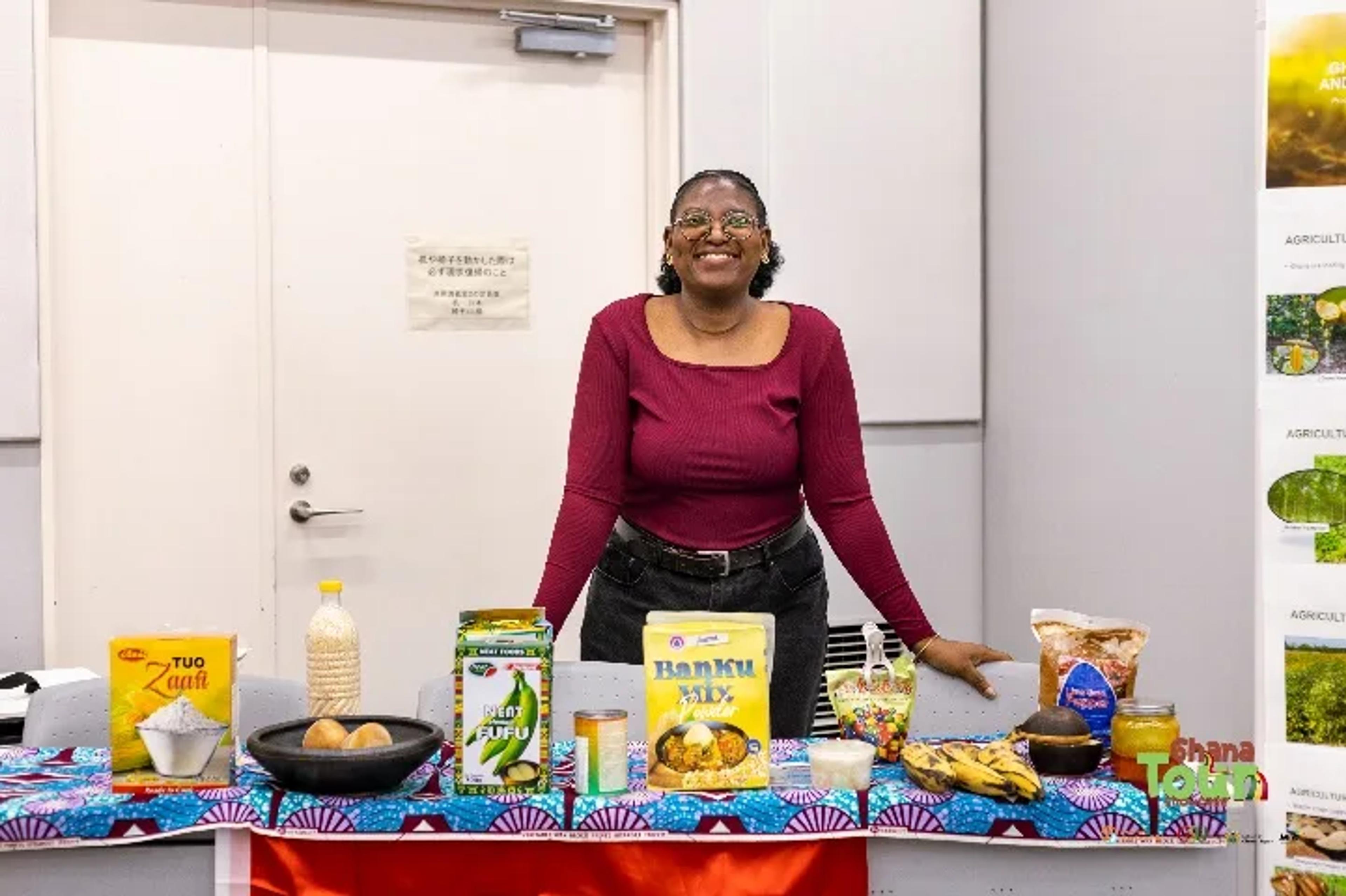 Samilia at a GSU-Japan cultural exhibition table