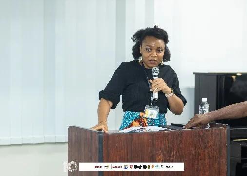 Eugenia as MC at the 10th Anniversary Symposium