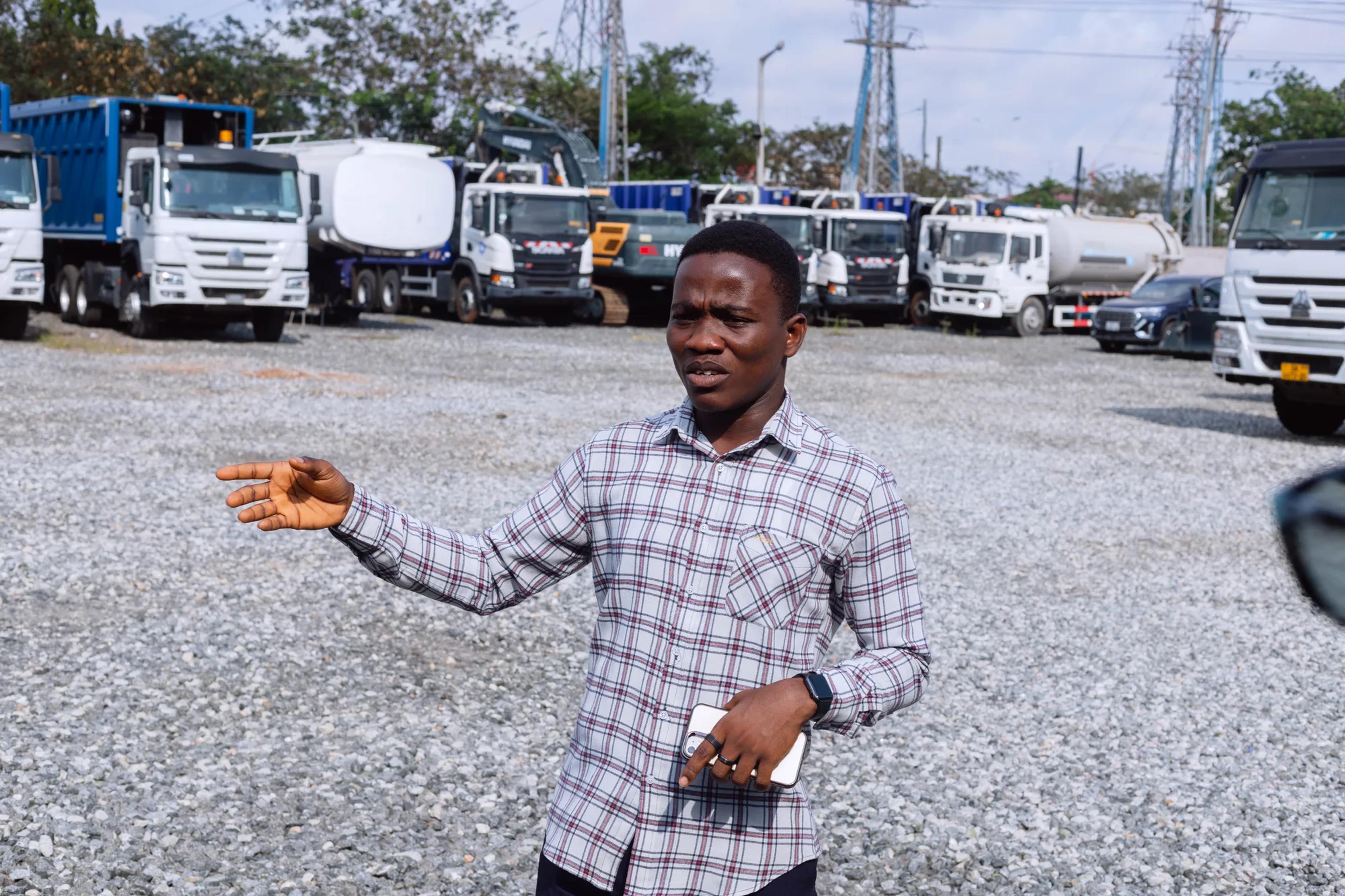 A J.A. Plant Pool guide explaining the yard to the team