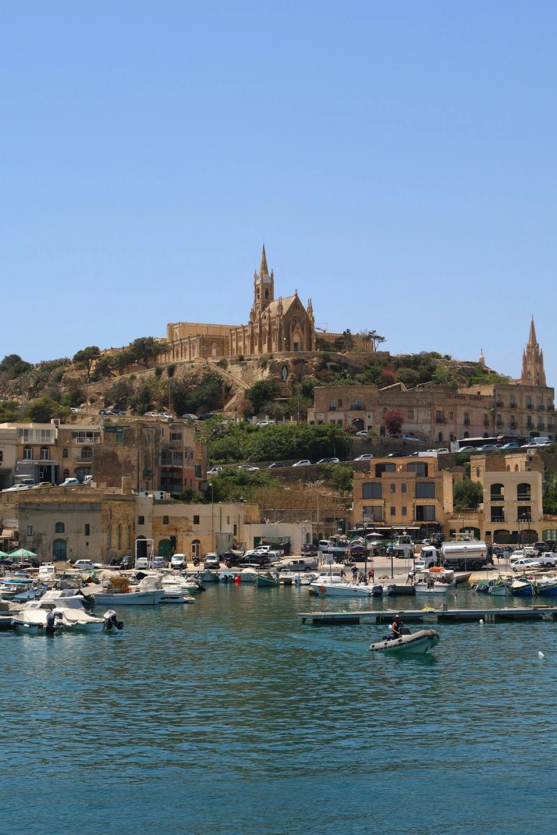Boats and waterfront buildings at Gozo’s harbour