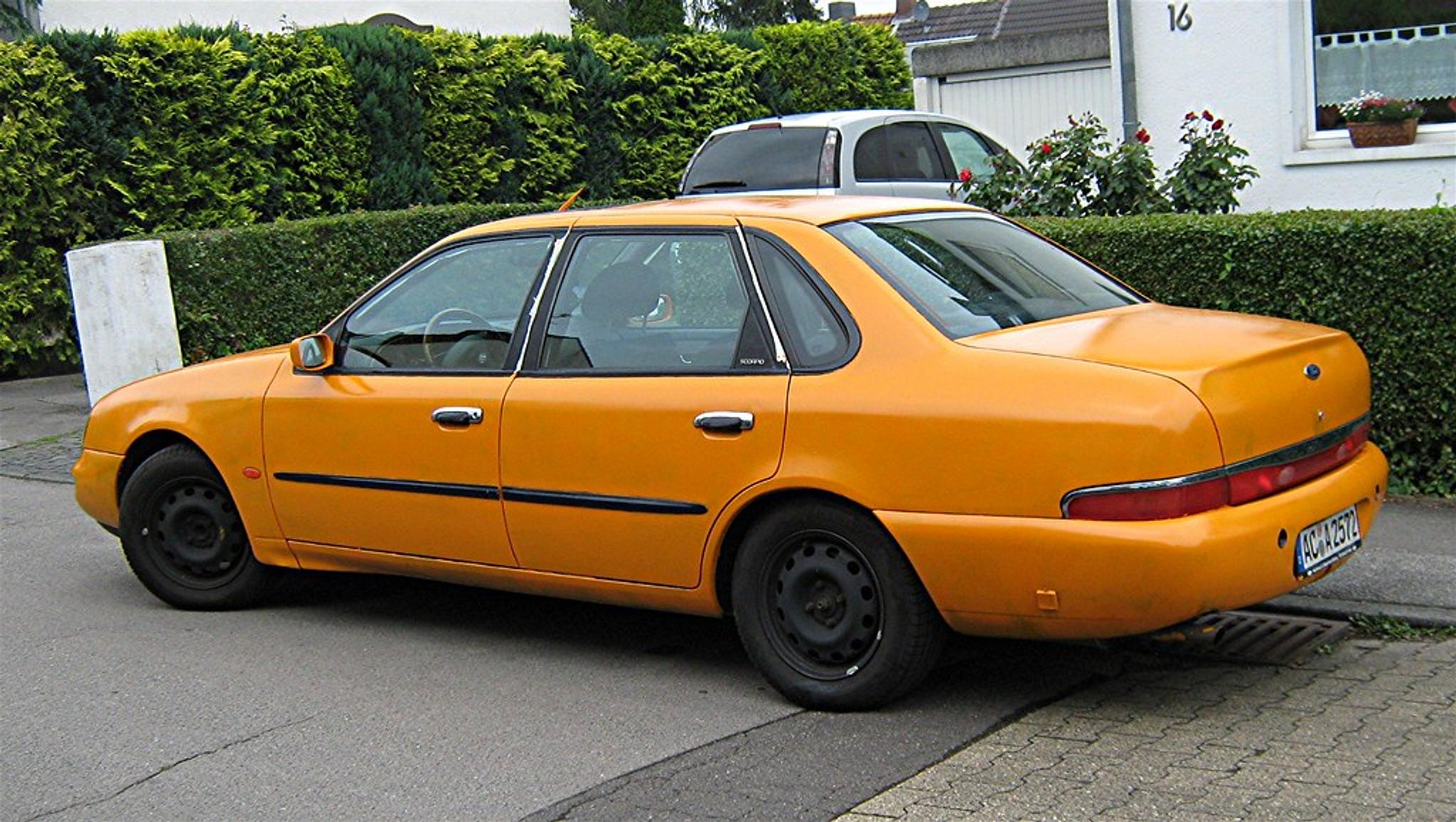 Orange Ford Scorpio mark 2