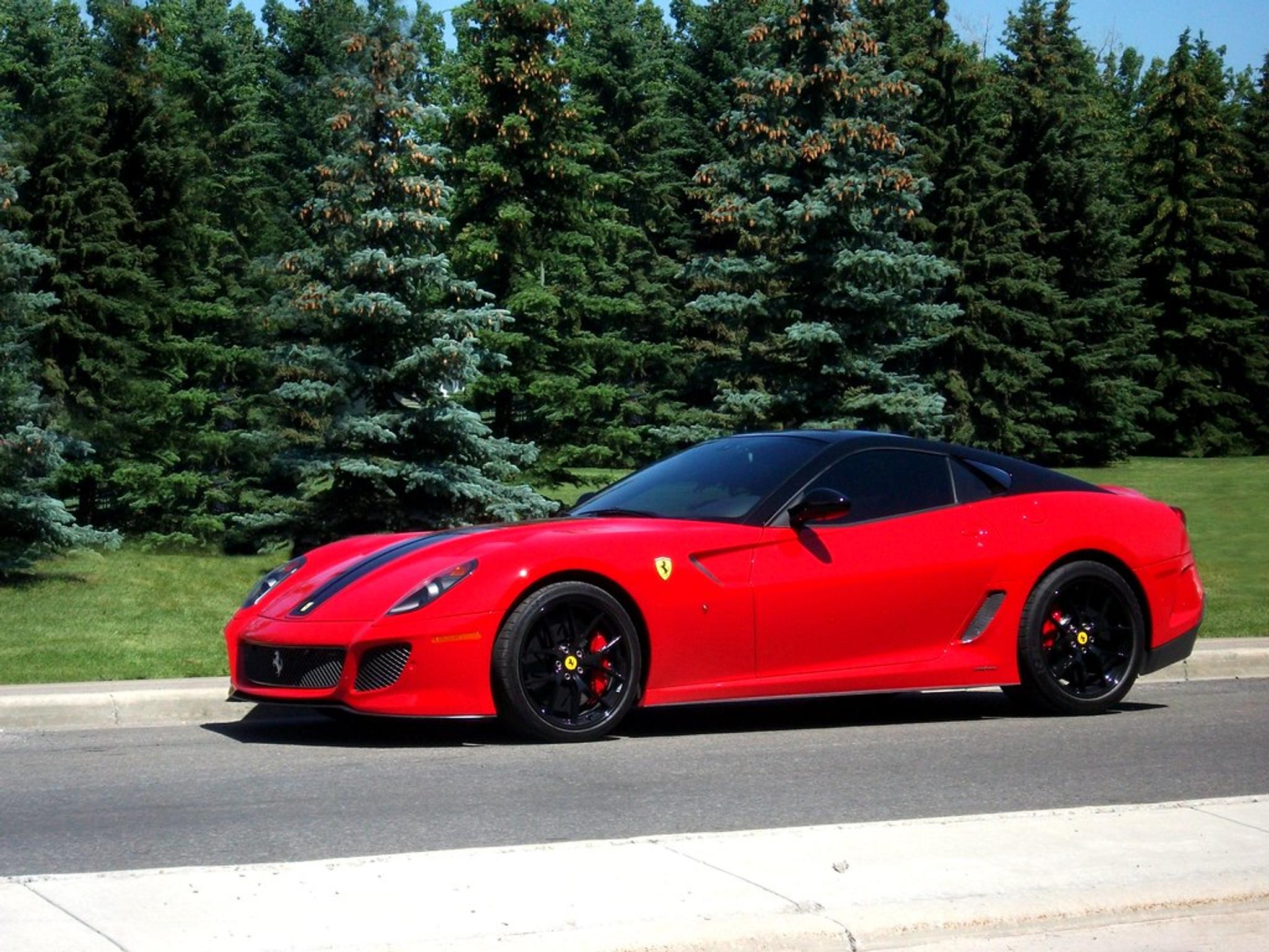 Red Ferrari 599 GTO with black stripe in the middle