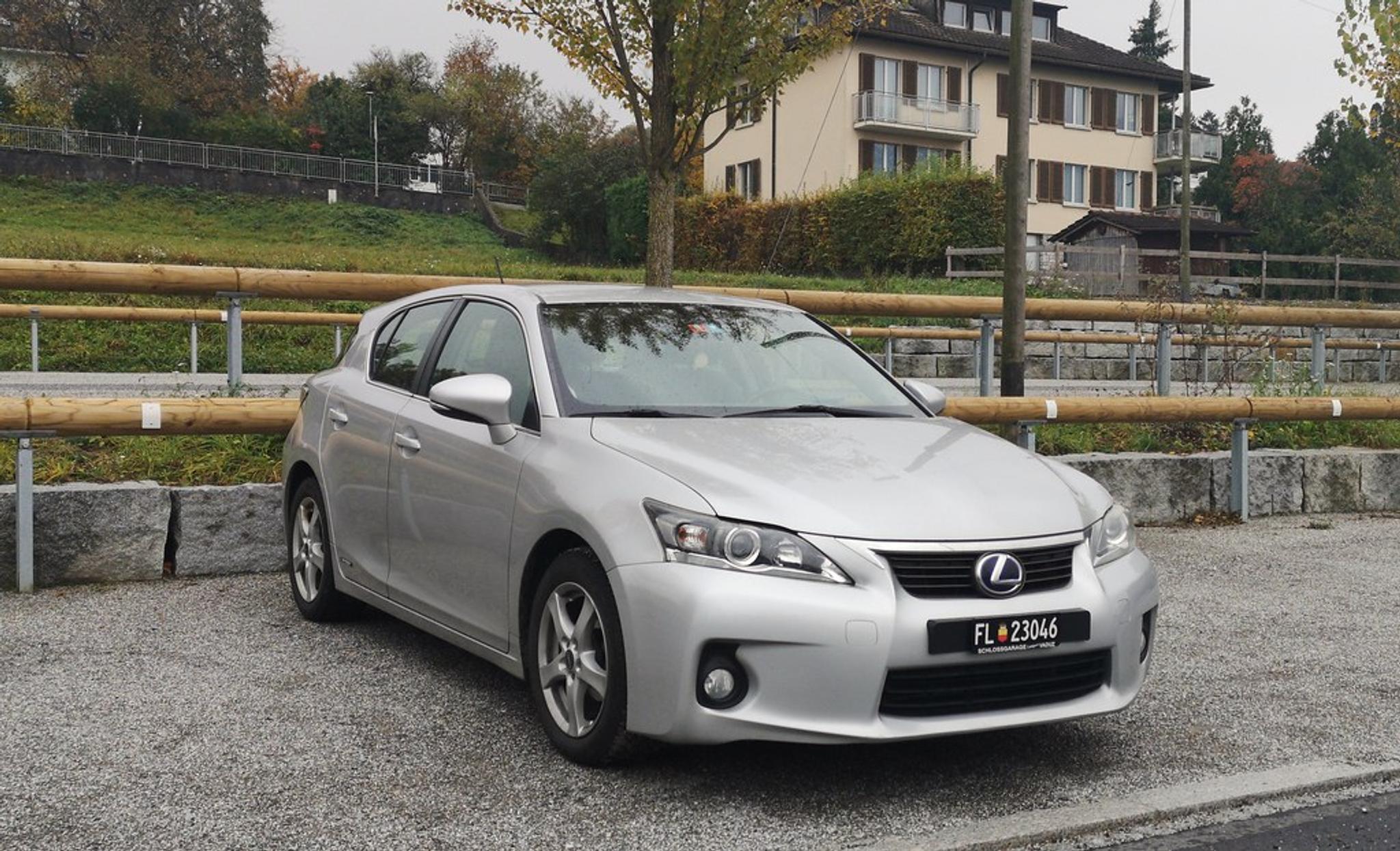 Silver Lexus CT on pavement