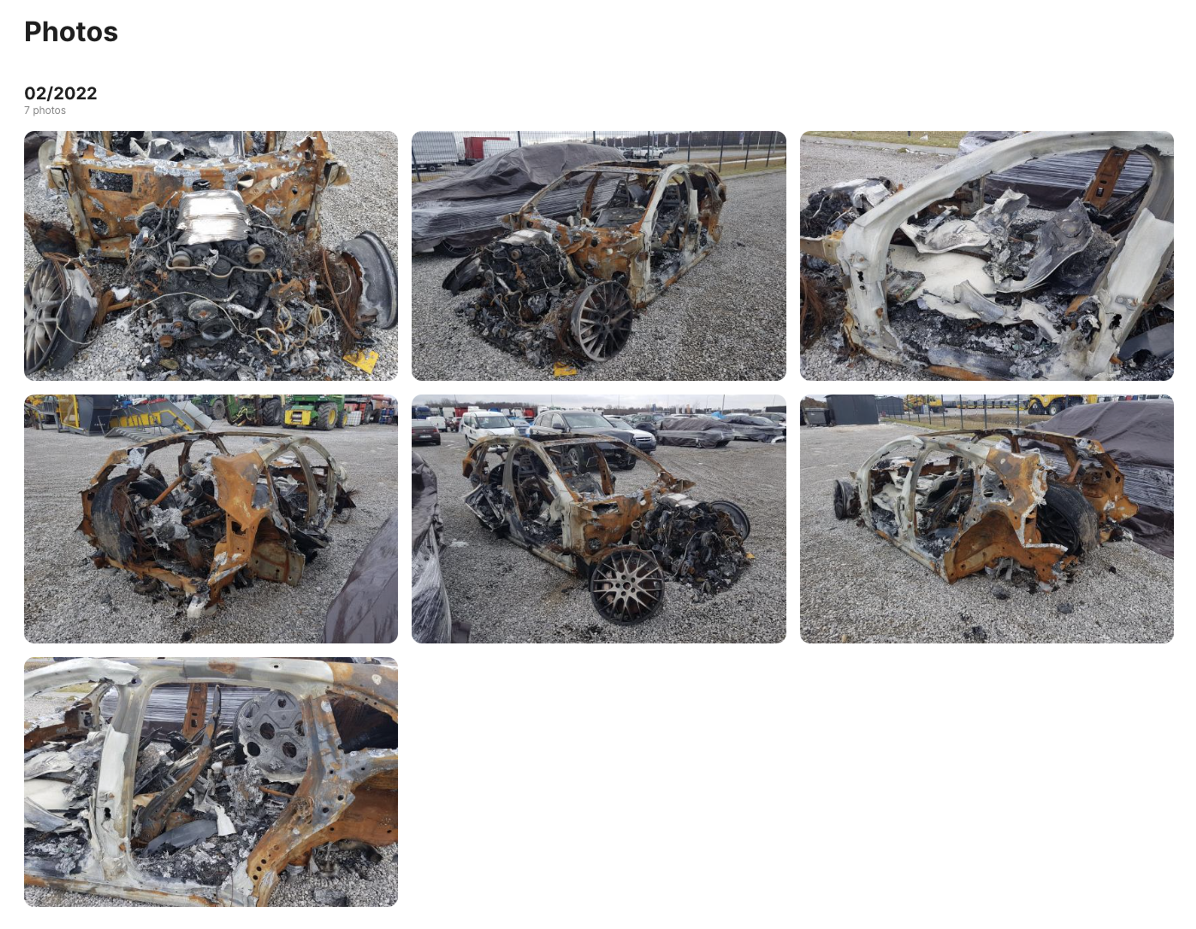 Burned Porsche Panamera in the Photo section of the carVertical report